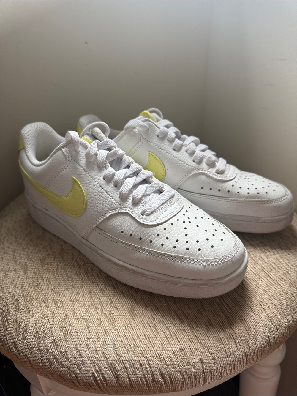 Nike Women’s White Leather Low-Top Sneakers with Pale Yellow Swoosh
